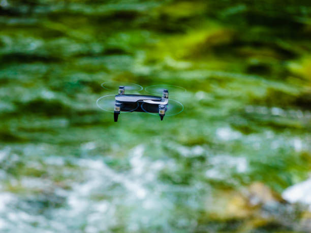 istock Drone flying over water nature 1195234328