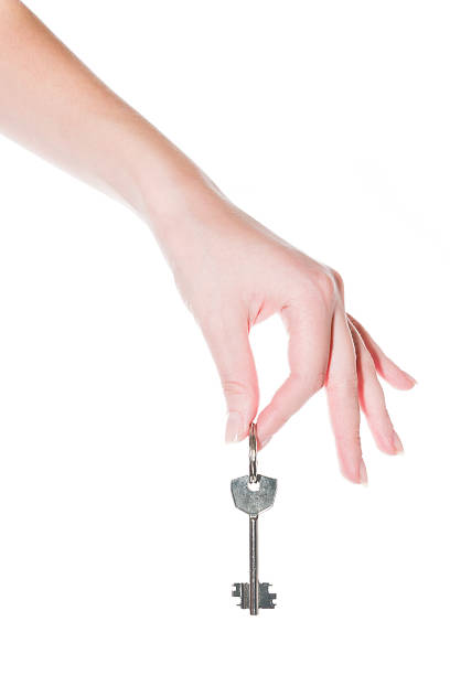istock Key in a female hand 119523645
