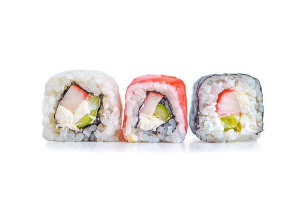 istock Rolls on a white isolated background, close-up. Japanese restaurant menu 1195236647