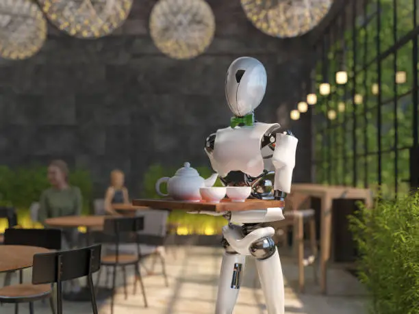 Photo of A humanoid robot waiter carries a tray of food and drinks in a restaurant. Artificial intelligence replaces maintenance staff. The concept of the future. 3D rendering