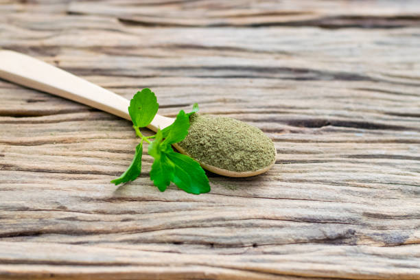 istock Stevia powder in wooden spoon 1195239546