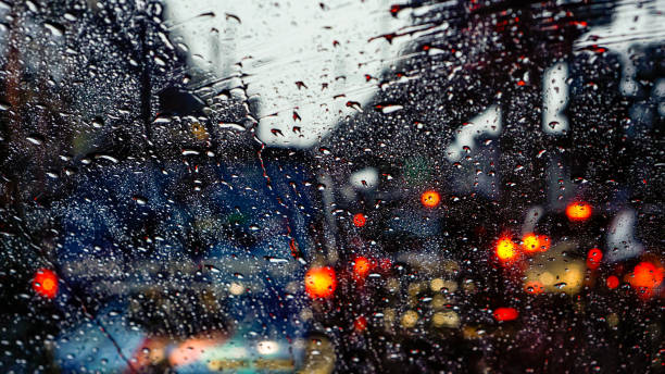 istock Blurred Background of Traffic Jam on Rainy Night 1195241109