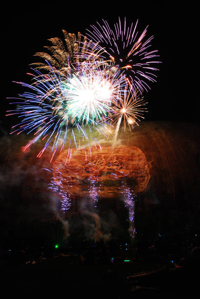 a firework display at stone mountain - laser firework display performance showing imagens e fotografias de stock