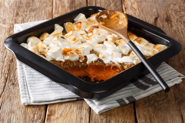 istock American sweet potato casserole with marshmallows close-up in a baking dish. horizontal 1195250181