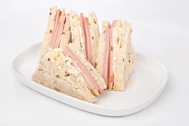 Photo of club sandwiches with ham and cheese