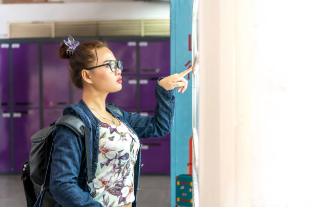 istock Borneo lady at the vending machine choosing a drink 1195251162