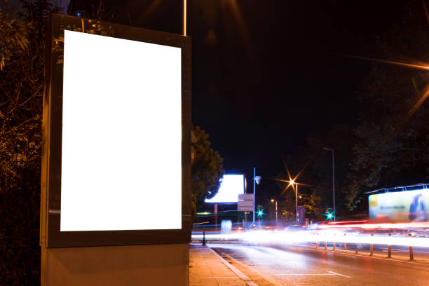 istock Billboard outdoor, advertising mockup, empty frame copy space for logo and text. Modern flat style signboard. Outdoor street banner night shot, long exposure. 1195251464