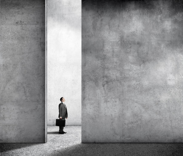 istock Small Businessman In Overwhelming Environment 1195258181