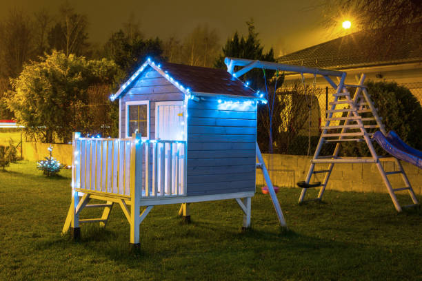 istock Kids garden house illuminated at night 1195260290