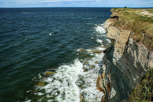 The Picture from the wild coast of Paldiski in Estonia. You can see the high cliffs above the sea.
