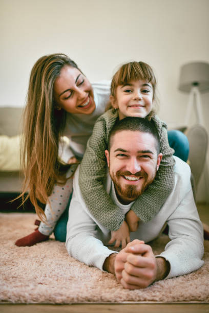 istock Happy Family Spending The Day Playing Together 1195262616