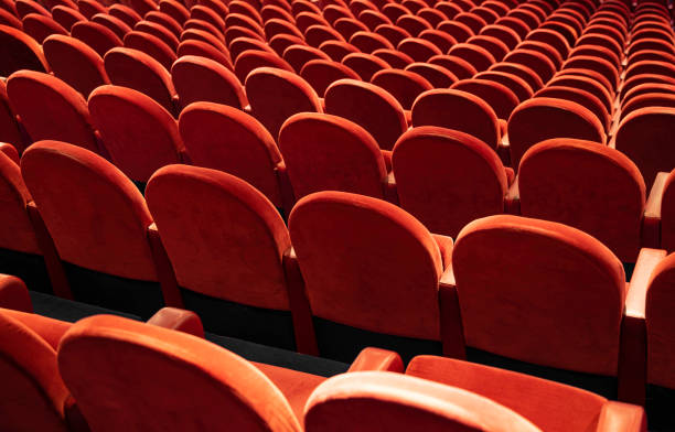 istock Empty comfortable red seats in the theatre/cinema 1195270816