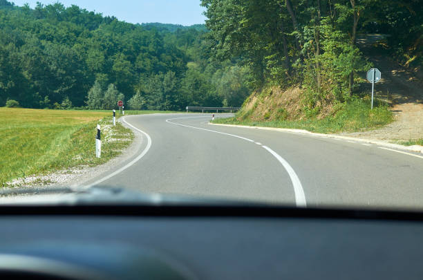 istock Winding country road 1195271101