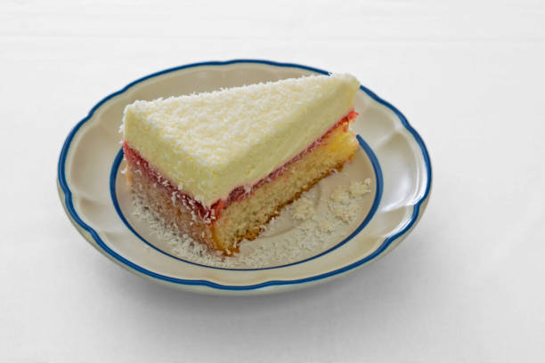 istock isolated coconut and strawberry cake 1195272086