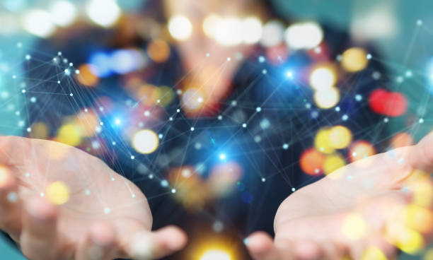 istock Businesswoman on blurred background using digital network connection 1195275281