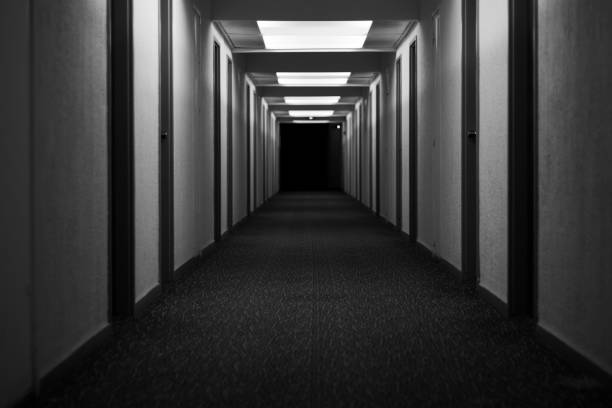 istock Corridor hallway hotel abandoned black and white 1195277168