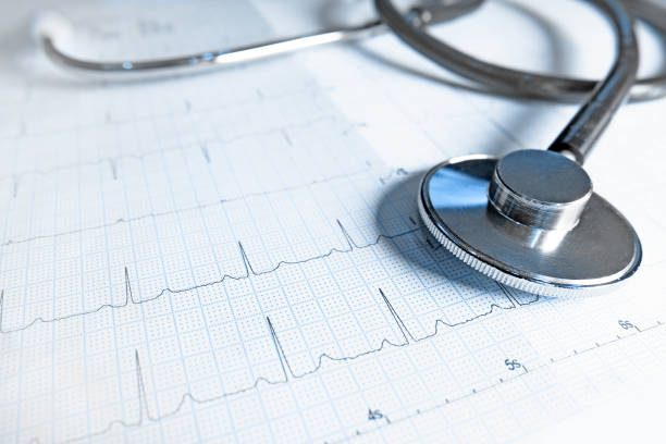 istock Medical concept. Cardiogram with stethoscope on table, closeup 1195277234