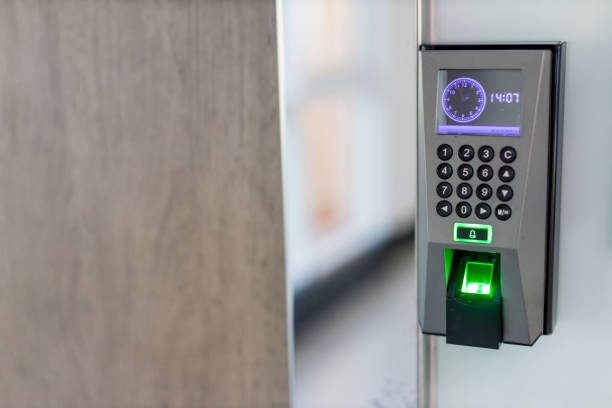 istock Finger scan on machine Security concept and safety. soft focus on hand scanning finger on machine concept. Businessman hand scanning finger on machine,Technology concept or Business concept. 1195282272