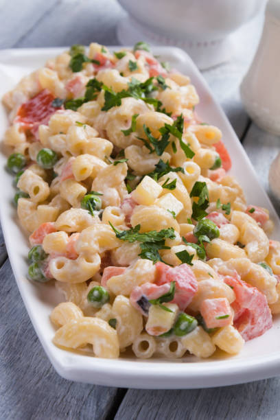 istock Homemade macaroni salad with vegetables 1195289488