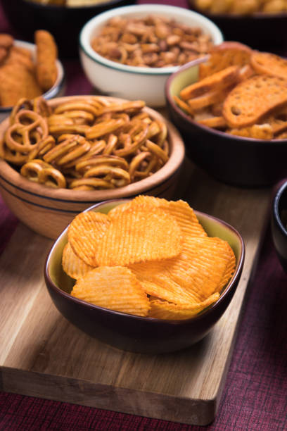 istock Salty snacks served in bowls 1195293809