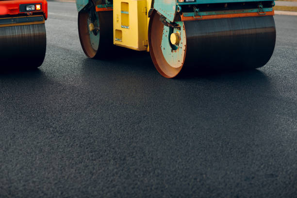 istock Asphalt paving. Road roller. New road construction. 1195294128