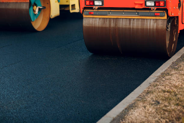 istock Asphalt paving. Paver road rollers. New road construction. 1195294131