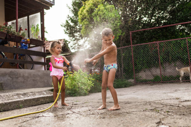 istock Splashing in the yard 1195299491
