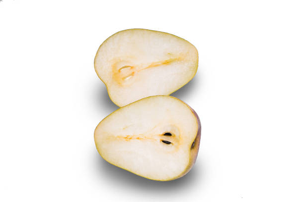 Pear cut in two isolated on a white background.