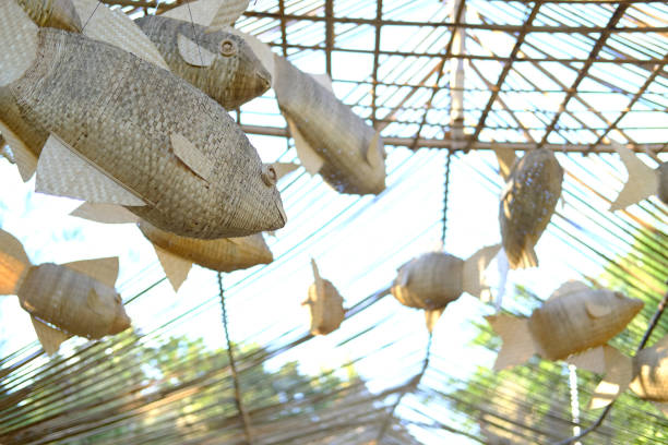 istock weaving wicker fish decorating on gazebo. Thai traditional ornament 1195307797