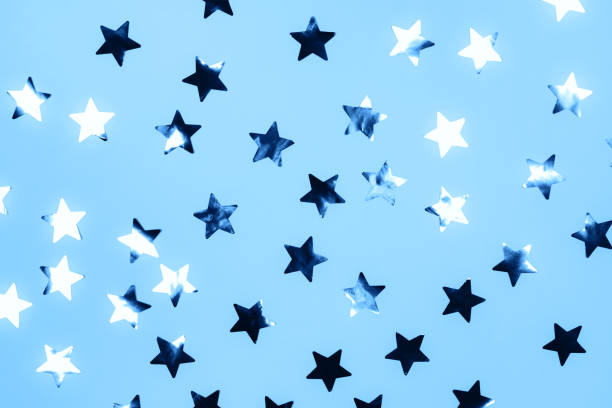 istock Golden stars on pink background 1195307855