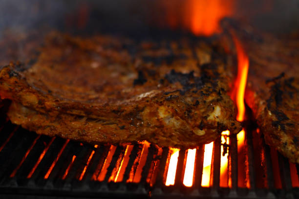 istock spice marinated beef spare ribs on a barbecue grill 1195308081