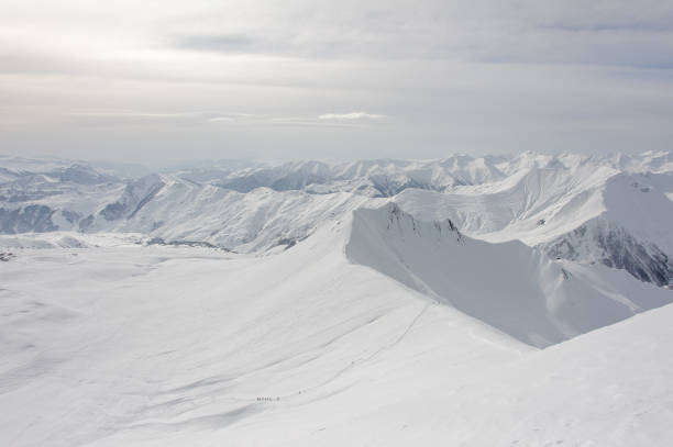 Astonishing and breathtaking view from the snowy high mountain top