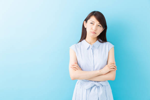 istock asian woman who thinks 1195317338
