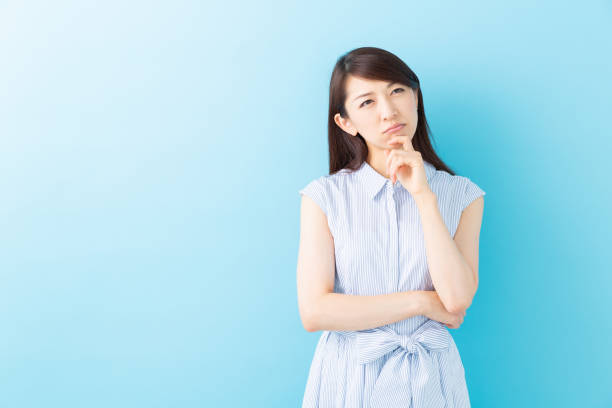 istock asian woman who thinks 1195317365