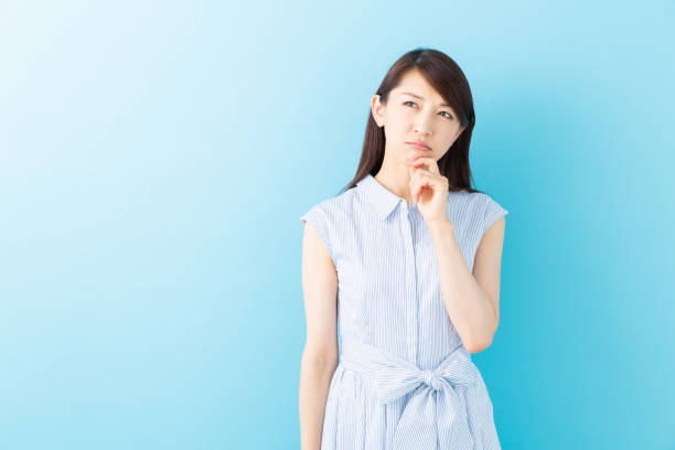 istock asian woman who thinks 1195317408
