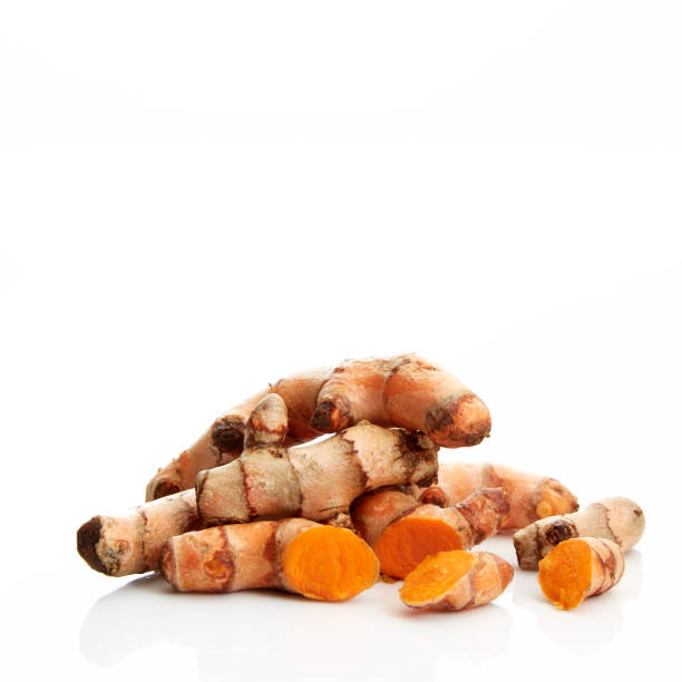 istock Fresh turmeric isolated on white background 1195331463