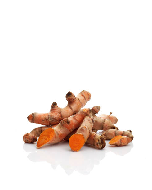 istock Fresh turmeric isolated on white background 1195331471