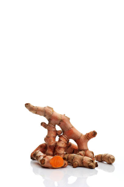 istock Fresh turmeric isolated on white background 1195331480
