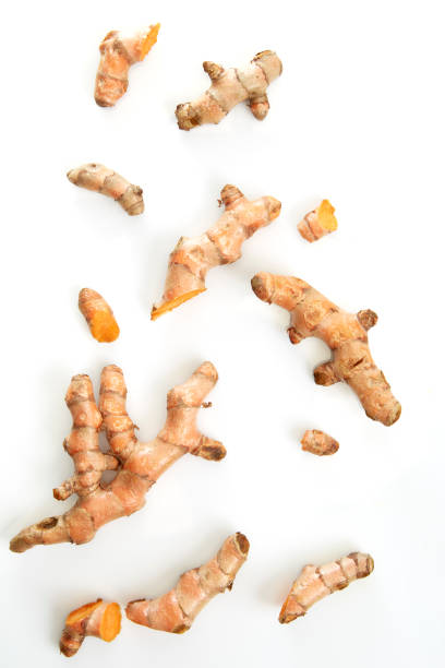 istock Fresh turmeric isolated on white background 1195331874