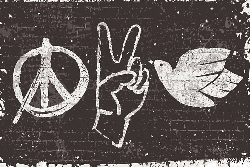 Vector illustration of peace symbols, the graphic symbol of peace, a hand in a victory gesture and a dove, in graffiti-style on a grunge black wall texture background.
