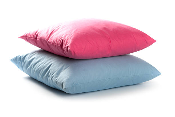 pink and blue pillows stock photo