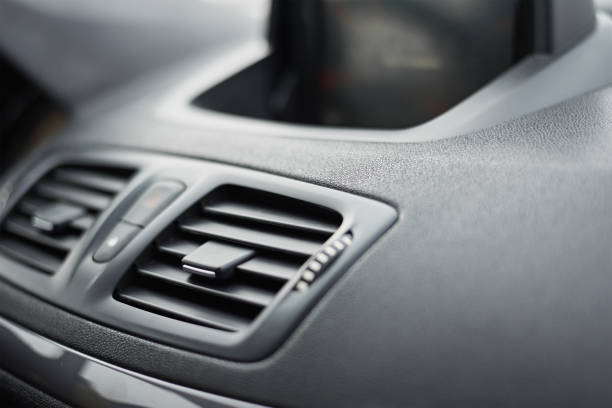 istock air conditioner ventilation grille in the car. Climate control panel 1195359208