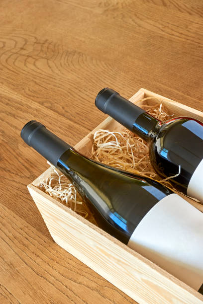 istock Wine bottles with blank label in wooden gift box 1195363066