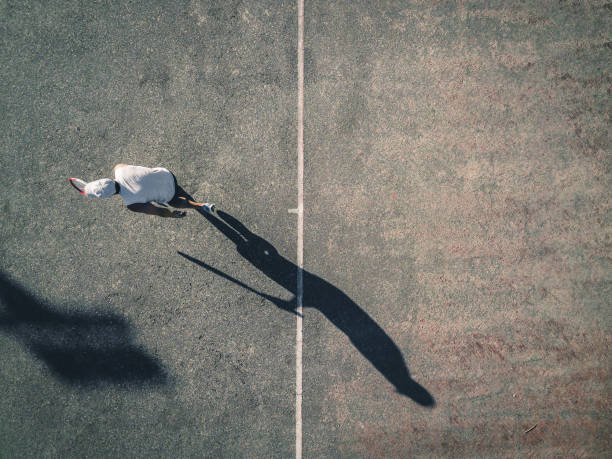 istock drone view on tennis at service 1195363777
