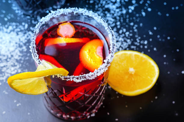 istock Punch drink sangria with fruit on dark background 1195364041
