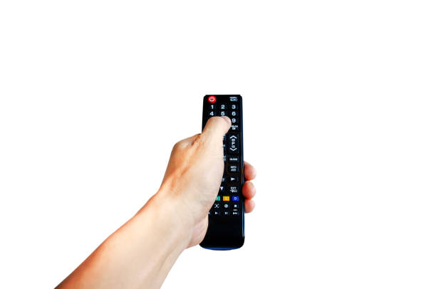 istock Hand holding television and audio multimedia remote control isolate on white background with clipping path 1195371314