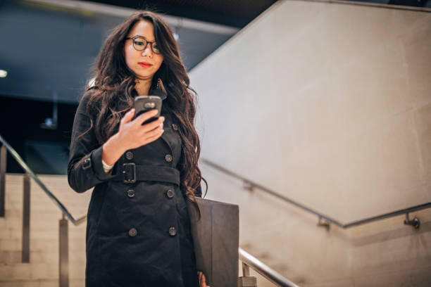 istock Pretty woman is text messaging 1195375407