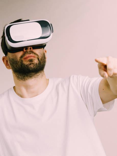 istock Adult man wearing vr goggles 1195377519