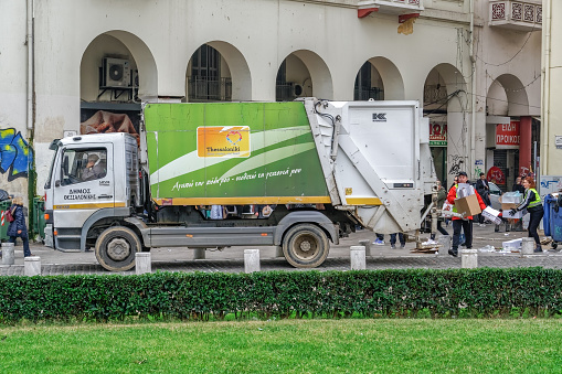 Thessaloniki, Greece - December 21 2019: Garbage track collecting waste disposal in Greece.