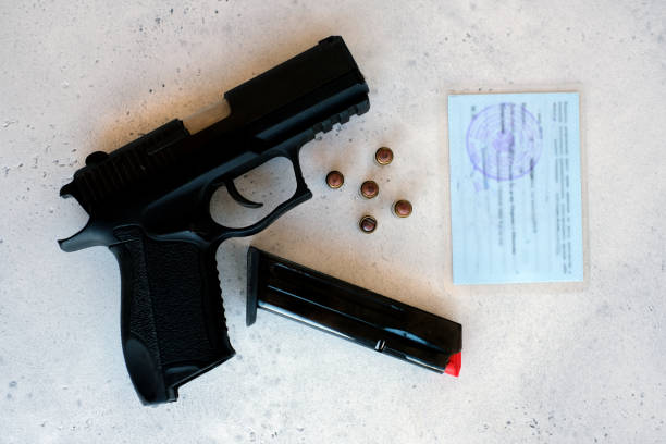 Purchase of 9mm pistol, permission to keep and carry hunting weapons pneumatic and firearms and the purchase of a pistol. stock photo